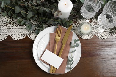 Photo of Luxury table setting with beautiful decor and blank card, flat lay. Festive dinner