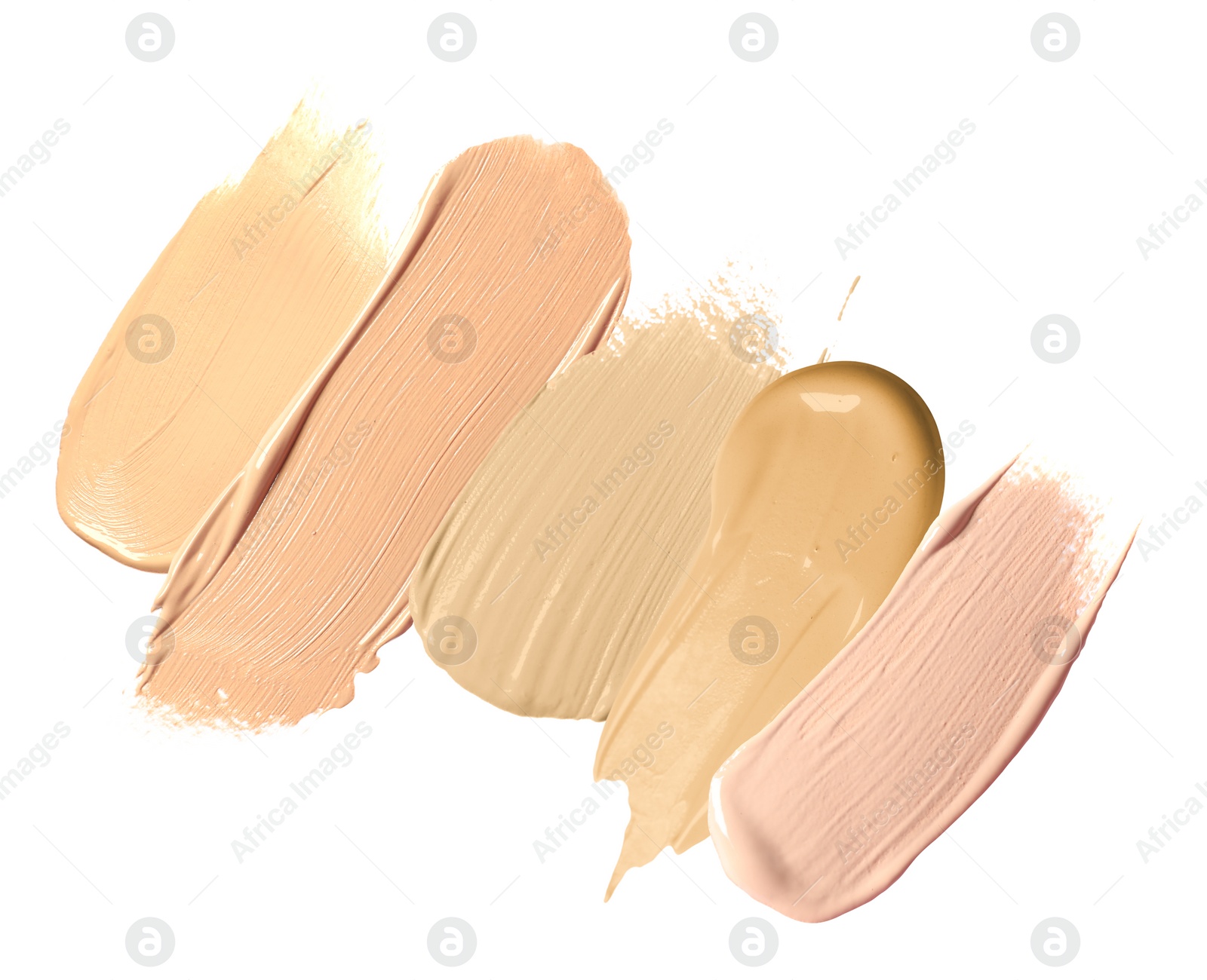 Image of Foundation of various shades for different skin tones isolated on white, top view. Set of samples