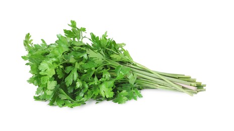 Photo of Heap of chopped parsley leaves isolated on white