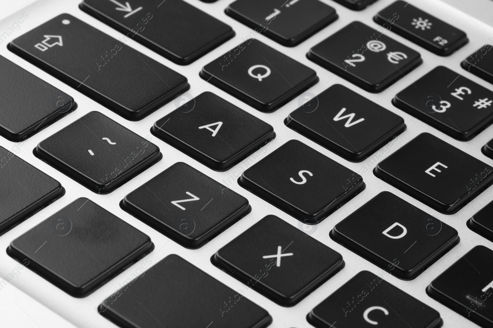 Photo of Closeup view of buttons on modern computer keyboard