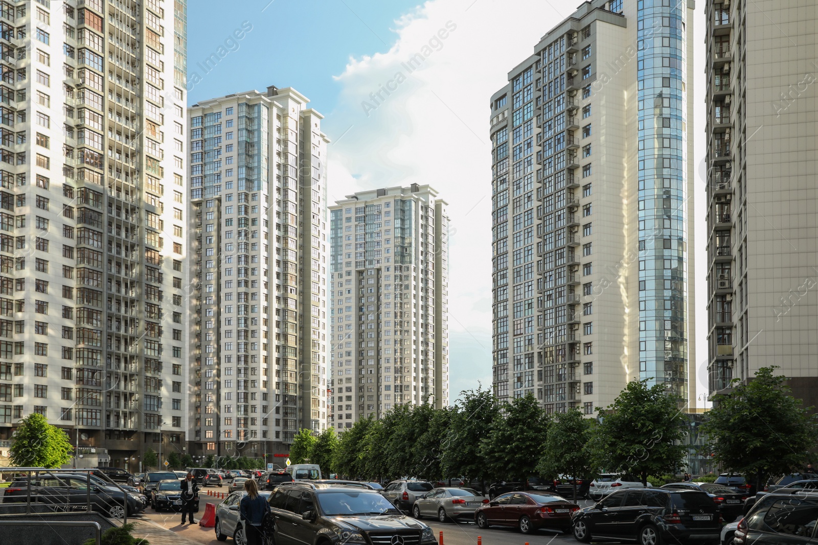 Photo of KYIV, UKRAINE - MAY 21, 2019: Beautiful view of modern housing estate in Pecherskyi district on sunny day