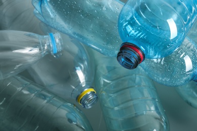 Photo of Many plastic bottles as background, closeup. Recycle concept