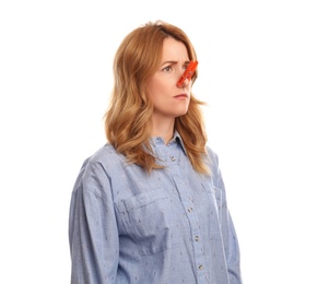 Woman with clothespin on white background. Runny nose concept