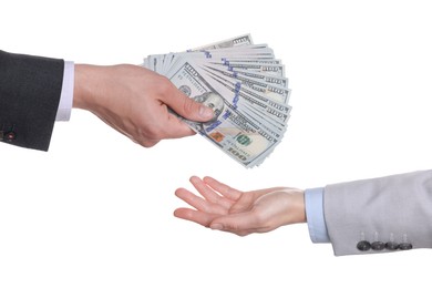 Photo of Money exchange. Man giving dollar banknotes to woman on white background, closeup