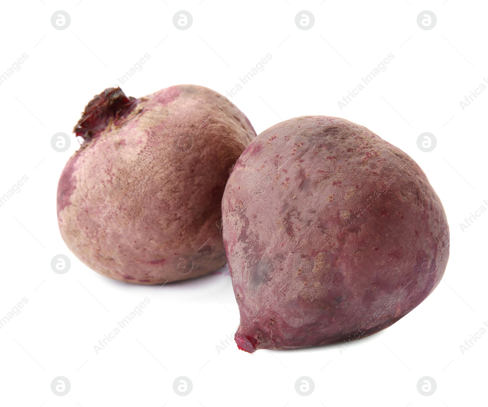 Photo of Whole boiled red beets on white background