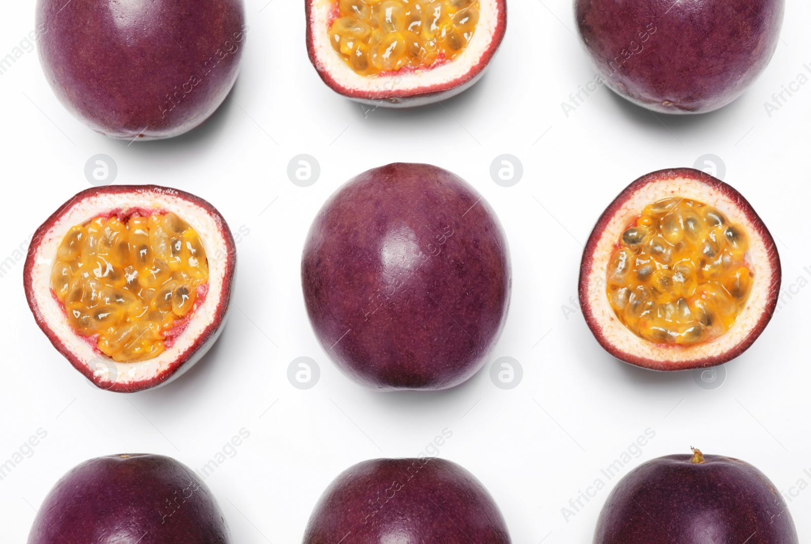 Photo of Fresh ripe passion fruits (maracuyas) on white background, flat lay