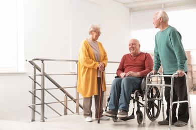 Photo of Grouphappy senior people in hospital