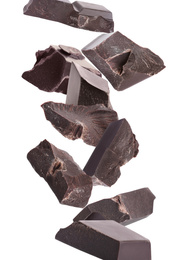 Image of Delicious chocolate chunks falling on white background