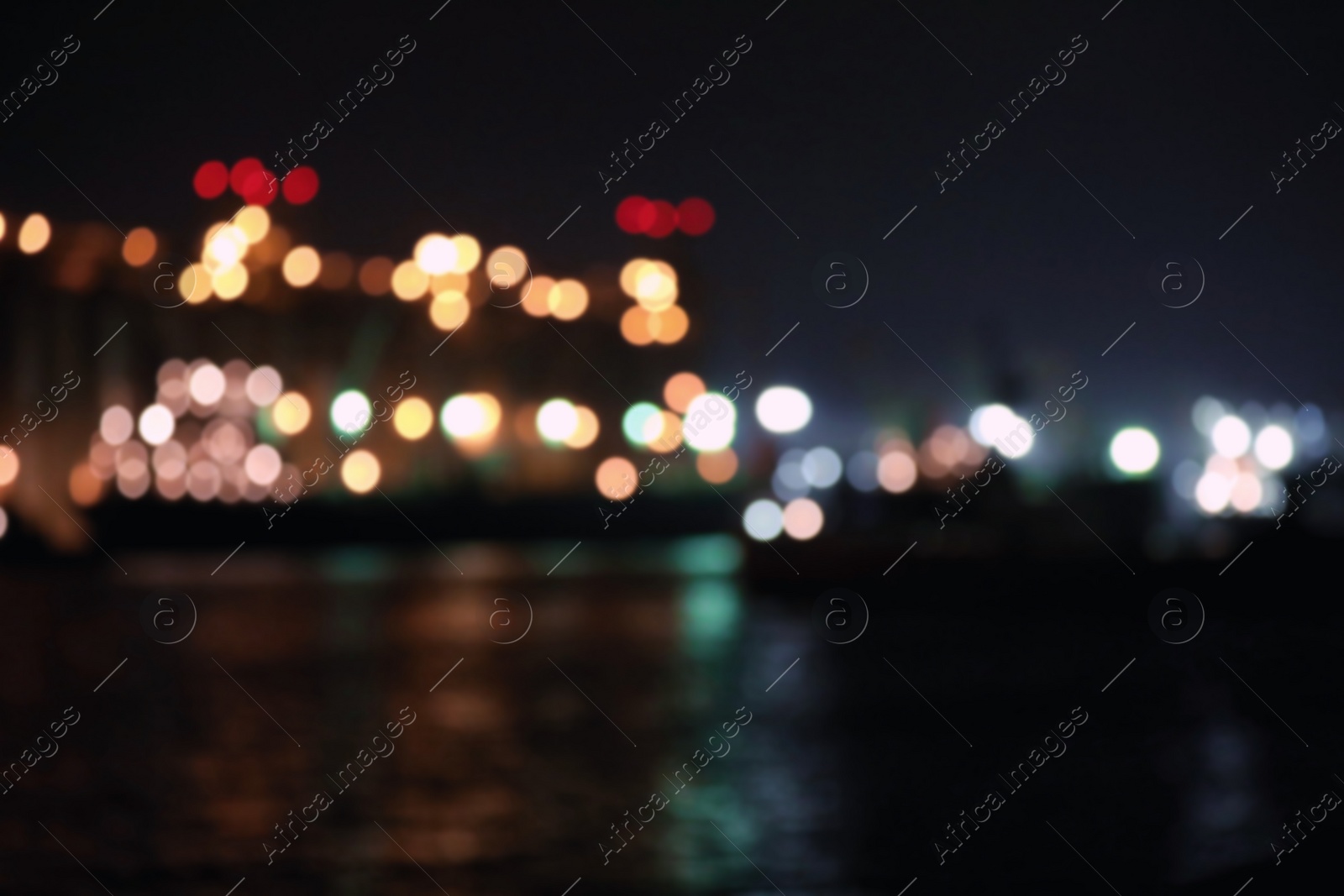 Photo of Blurred view of docks at night. Bokeh effect