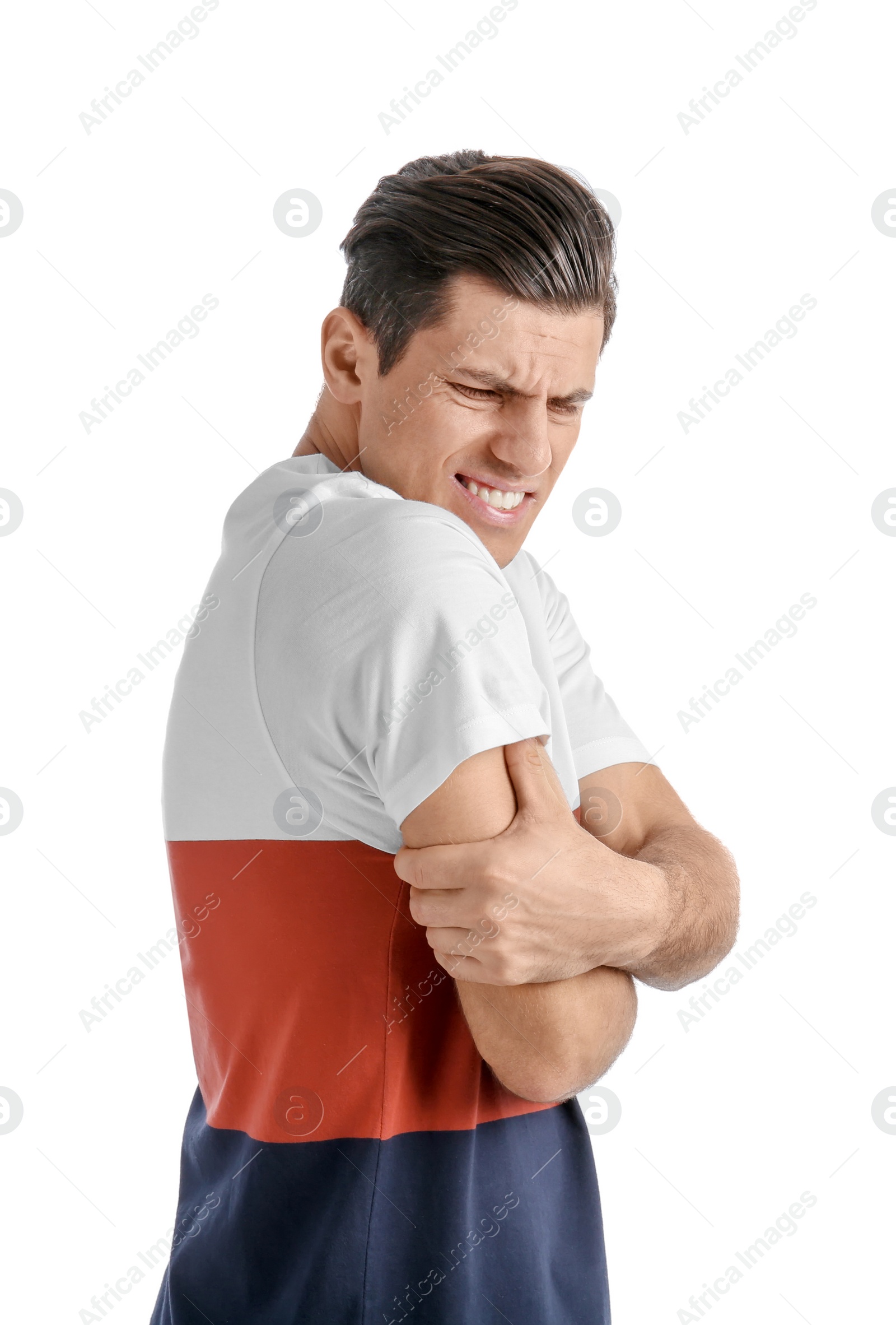 Photo of Young man suffering from pain in arm on white background