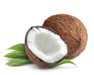 Image of Tasty ripe coconuts and green leaves on white background