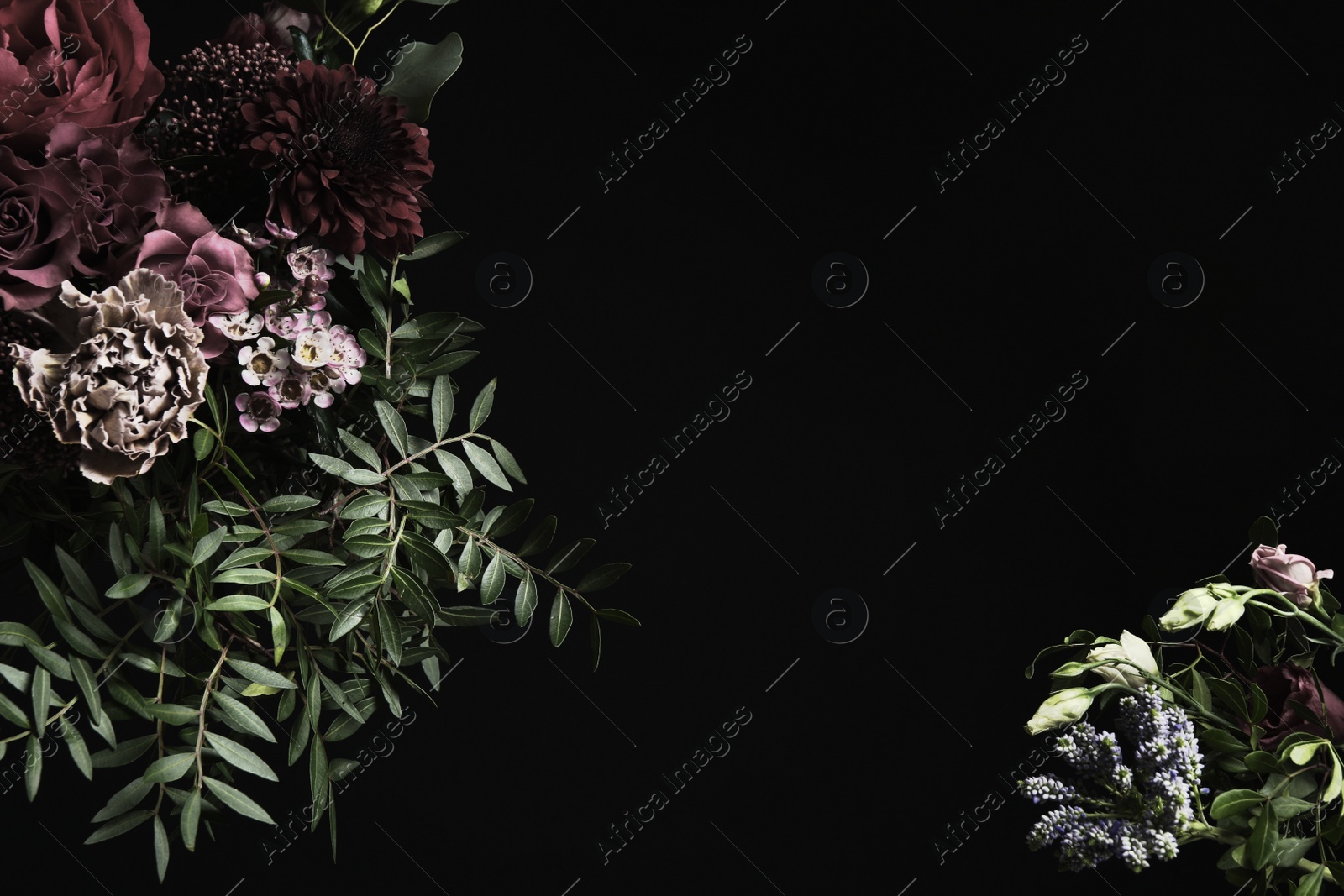 Photo of Beautiful bouquet of different flowers on black background, space for text. Floral card design with dark vintage effect