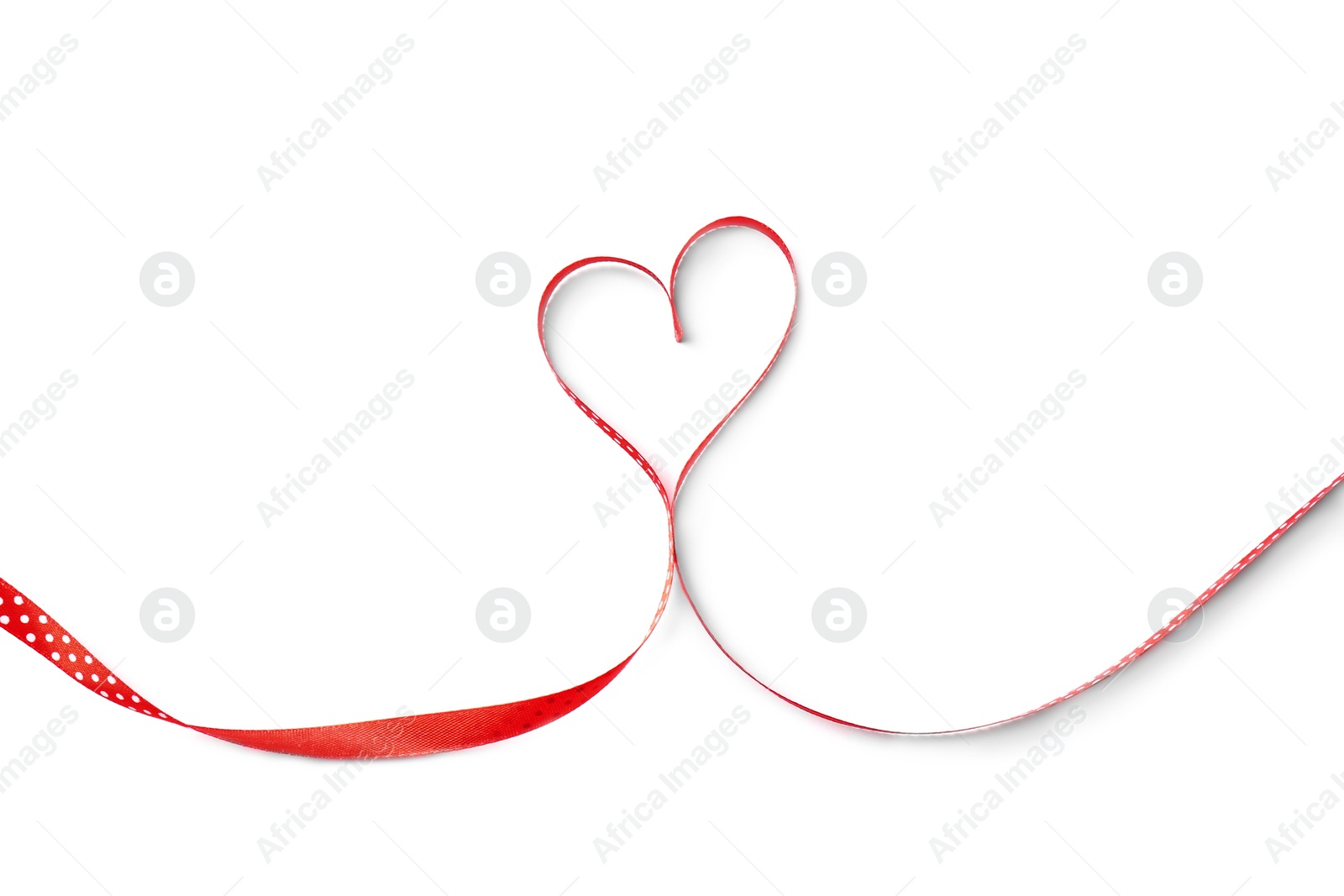 Photo of Heart made of satin ribbon on white background, top view