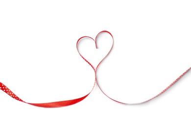 Photo of Heart made of satin ribbon on white background, top view