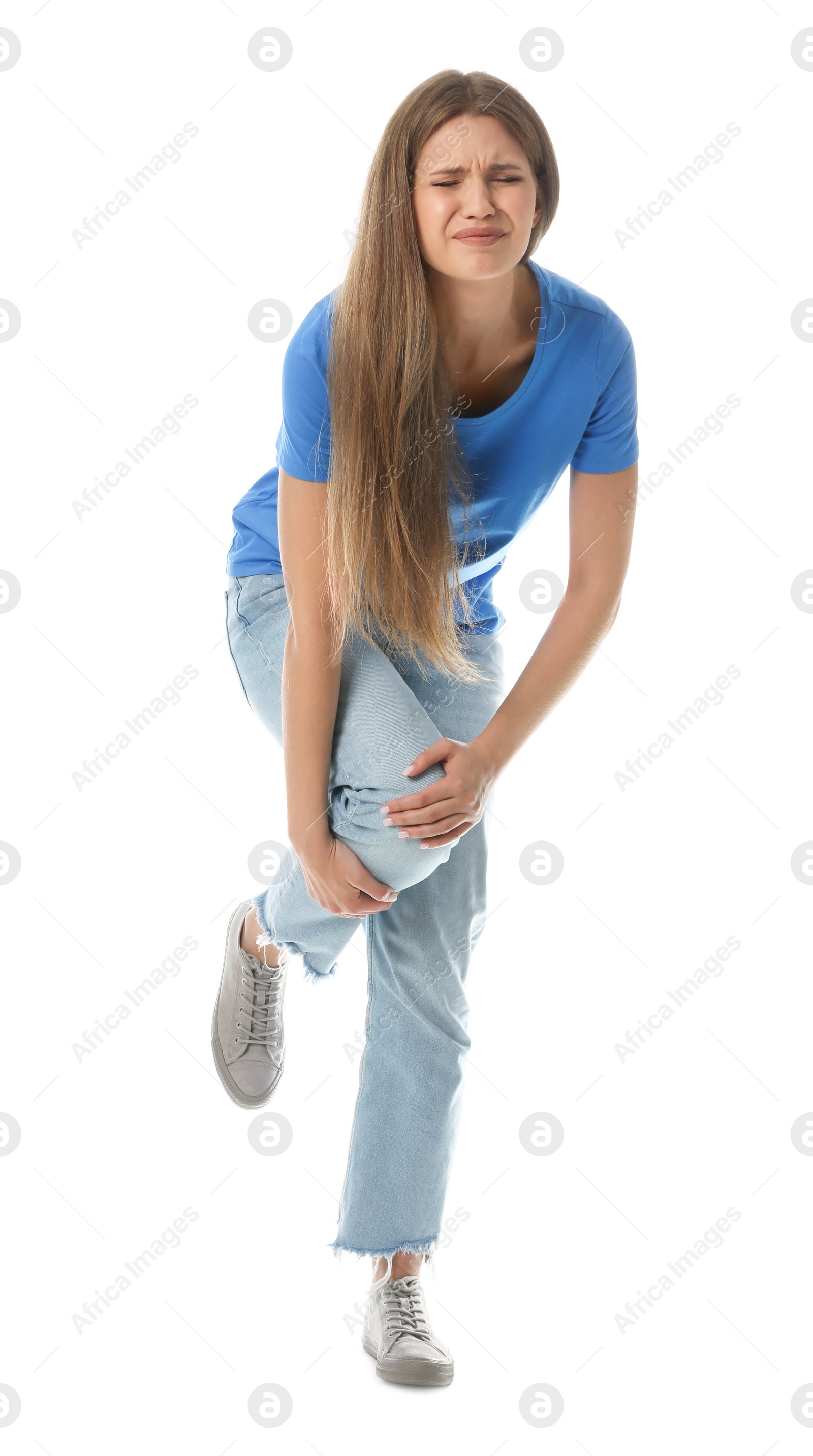 Photo of Full length portrait of woman having knee problems on white background