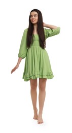 Photo of Beautiful girl in green dress on white background