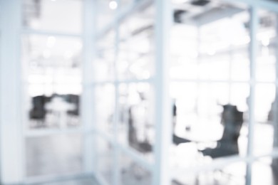 Image of Office interior. Blurred view of comfortable workspace