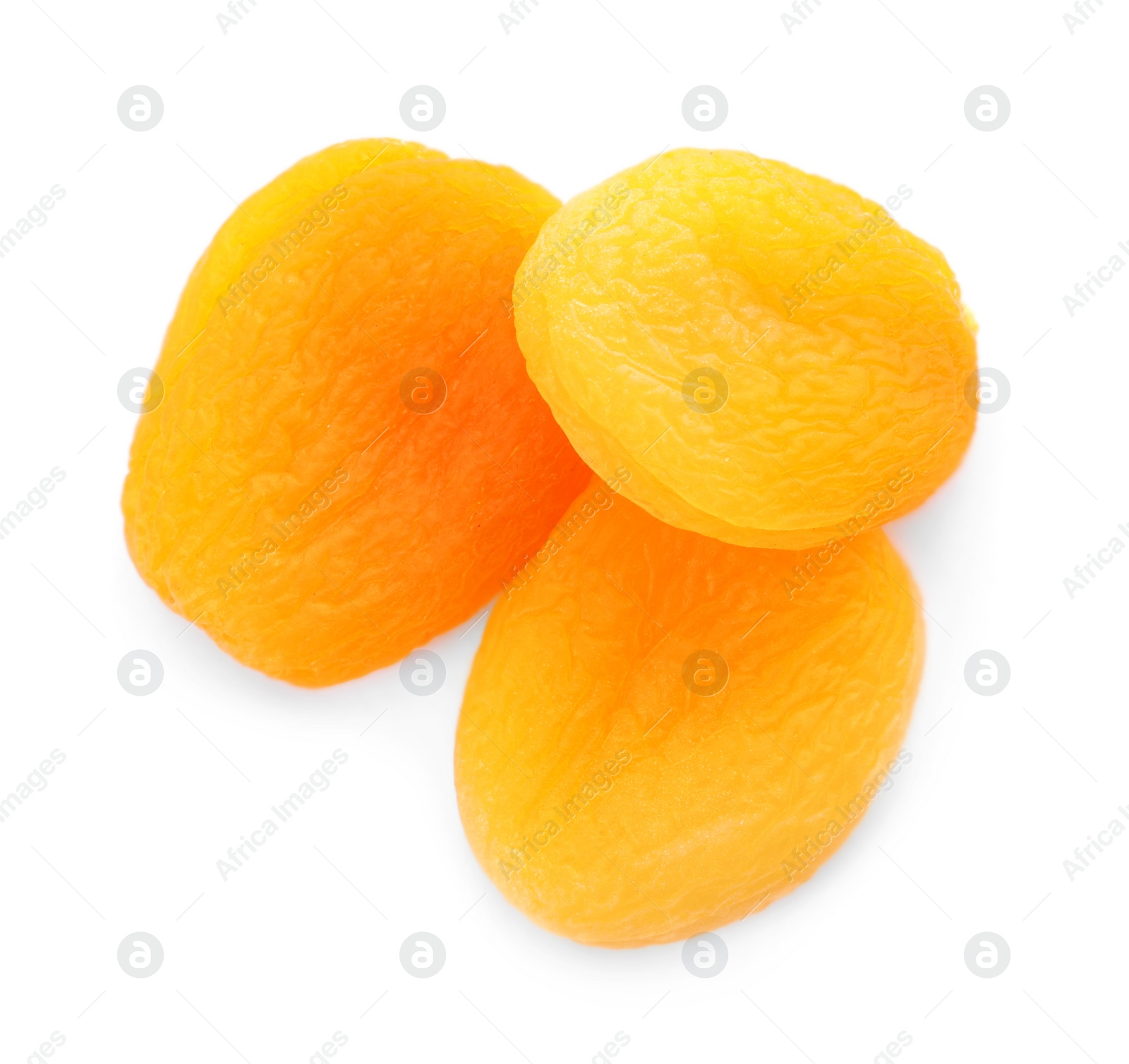 Photo of Tasty apricots on white background, top view. Dried fruits