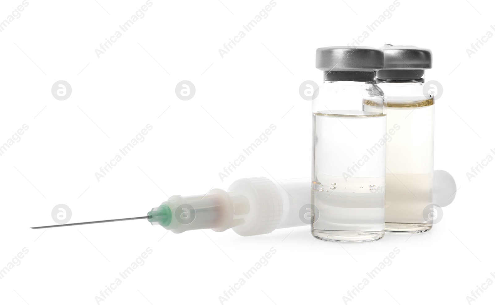 Photo of Disposable syringe with needle and vials isolated on white