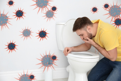 Young man suffering from nausea over toilet bowl and bacteria illustration. Food poisoning