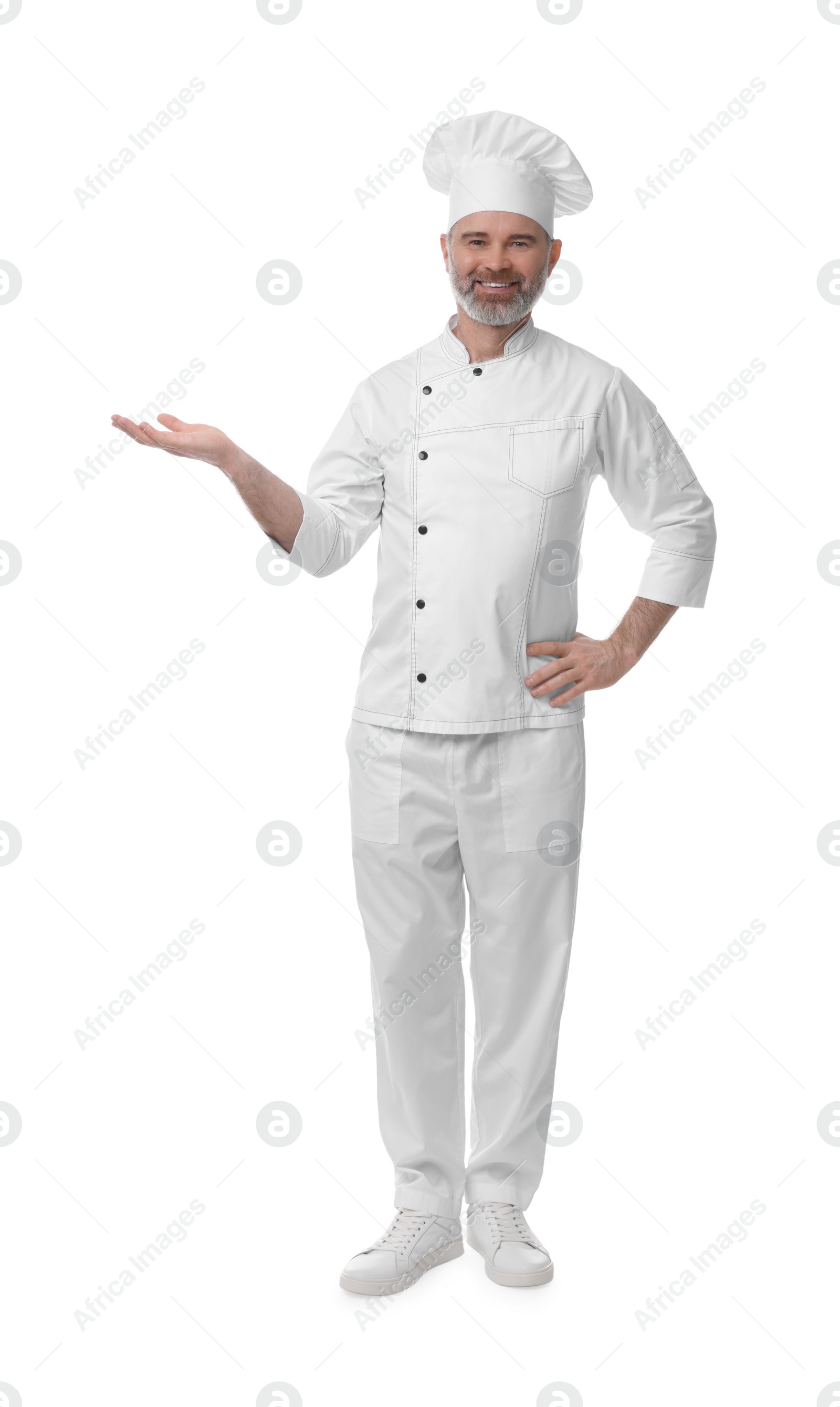 Photo of Happy chef in uniform posing on white background