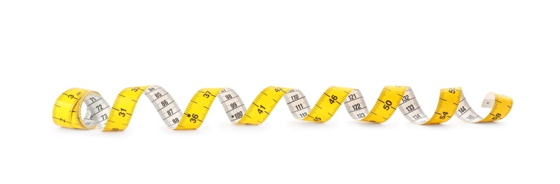 Photo of New yellow measuring tape isolated on white