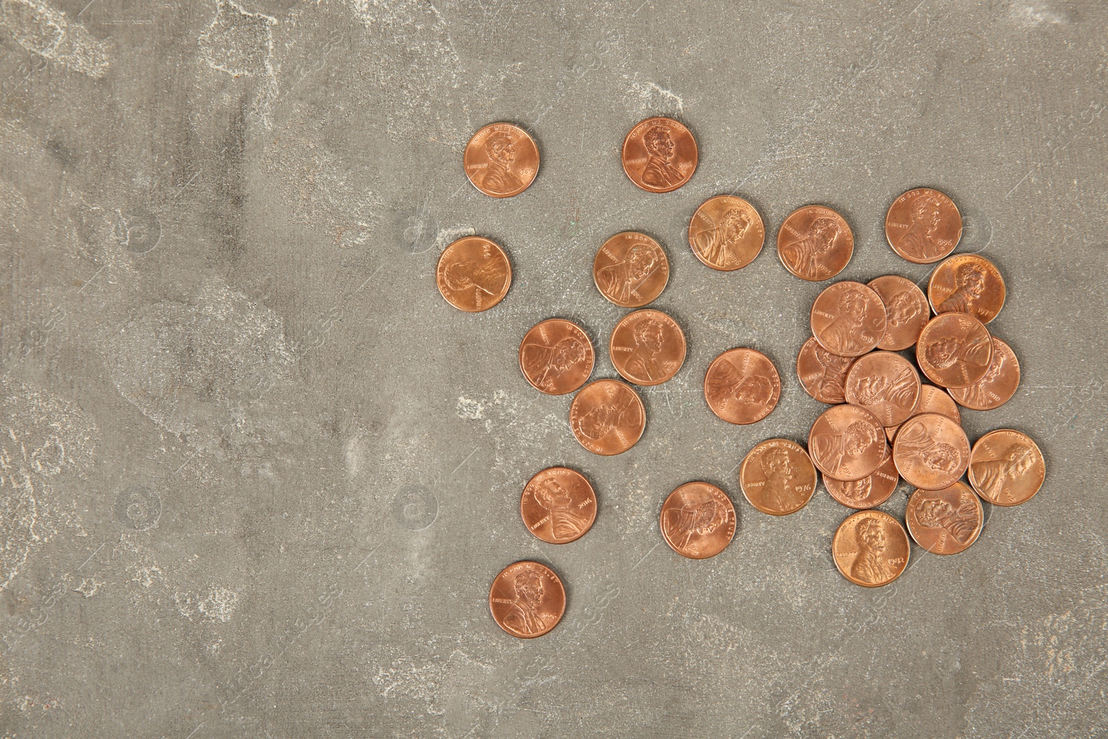 Photo of Many coins on color background, top view. Space for text