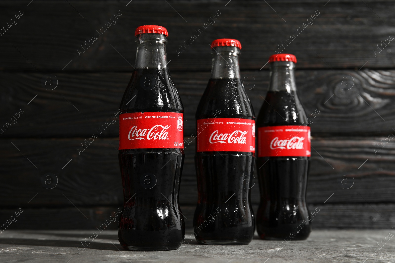 Photo of MYKOLAIV, UKRAINE - NOVEMBER 15, 2018: Bottles of Coca Cola on table