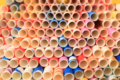 Photo of Many paper drinking straws as background, closeup