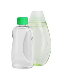 Transparent bottles with baby oil and gel isolated on white