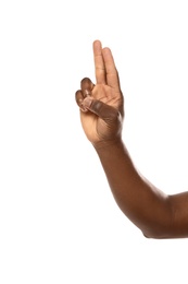 African-American man making promise on white background, closeup