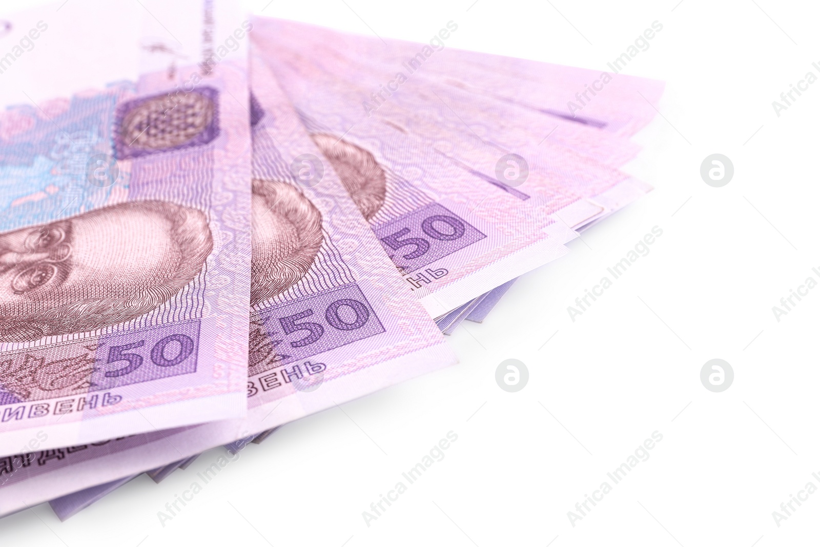 Photo of 50 Ukrainian Hryvnia banknotes on white background, closeup