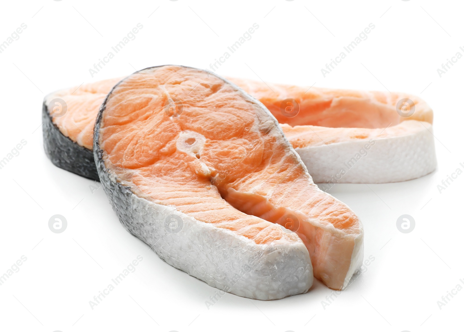 Photo of Fresh salmon steaks on white background