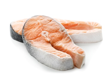 Photo of Fresh salmon steaks on white background