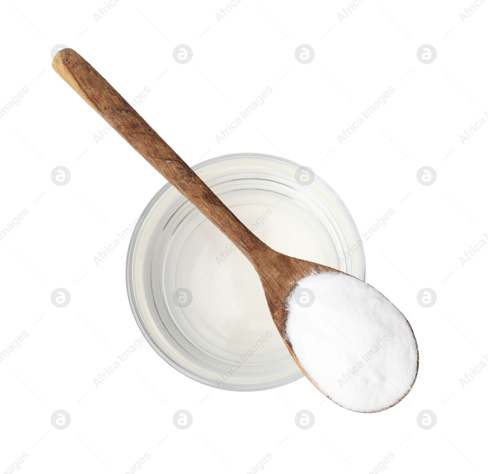 Photo of Vinegar in glass bowl, baking soda and spoon isolated on white