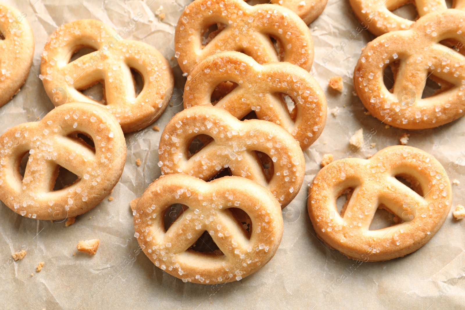 Photo of Tasty Danish butter cookies on paper background