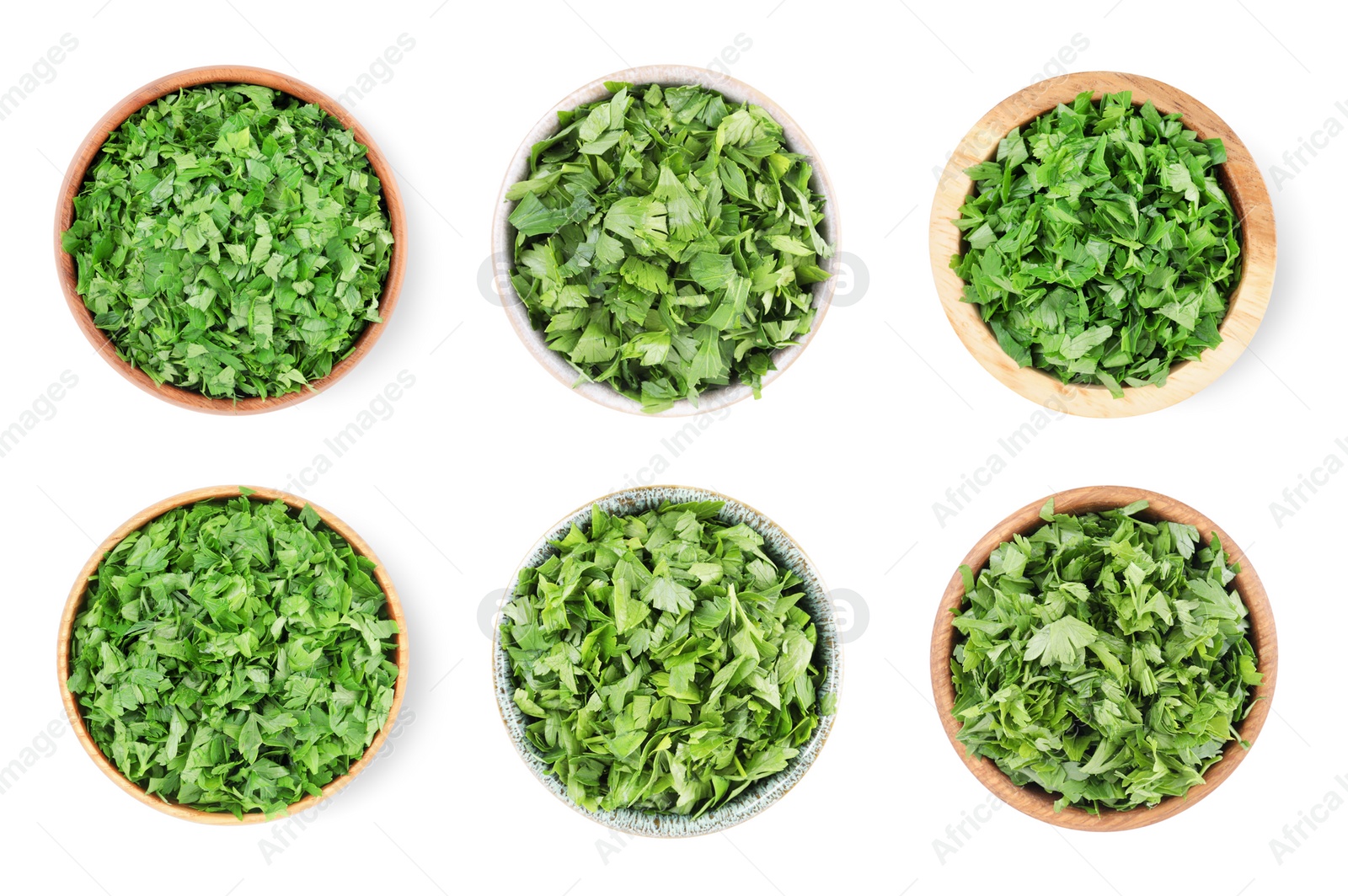 Image of Set with cut parsley in bowls isolated on white, top view