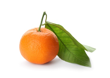 Whole fresh tangerine with green leaves isolated on white