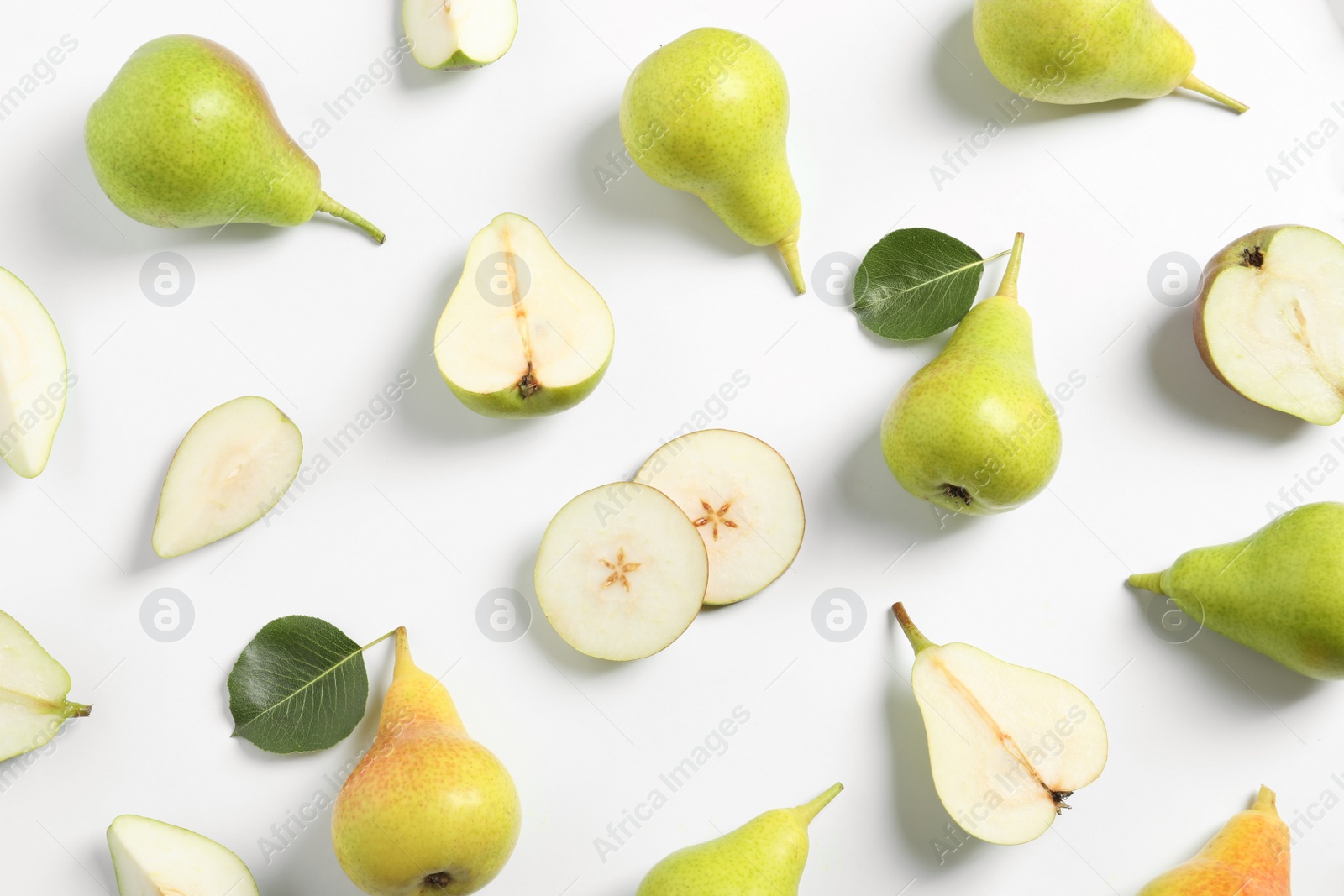 Photo of Ripe juicy pears on white background, top view