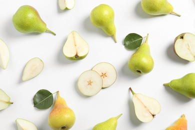 Ripe juicy pears on white background, top view