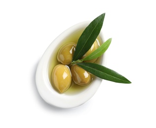 Bowl with fresh olives in oil on white background, top view