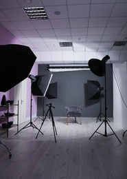 Photo of Interior of modern photo studio with professional equipment