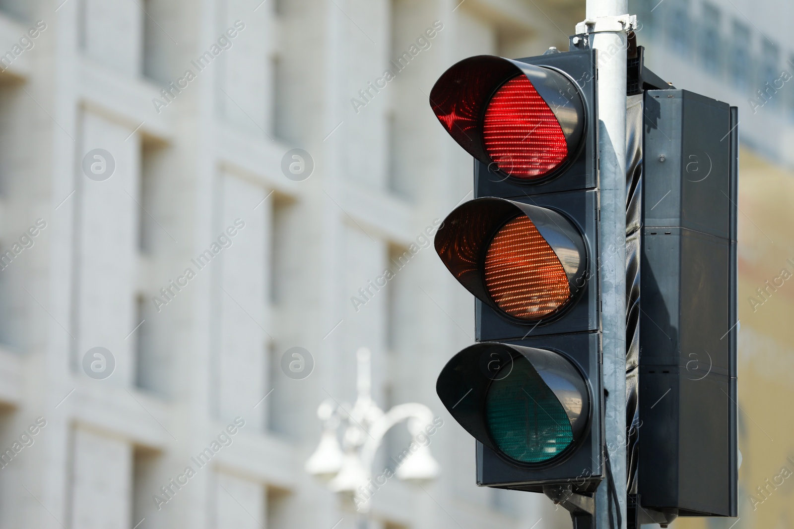 Photo of View of traffic light in city, space for text