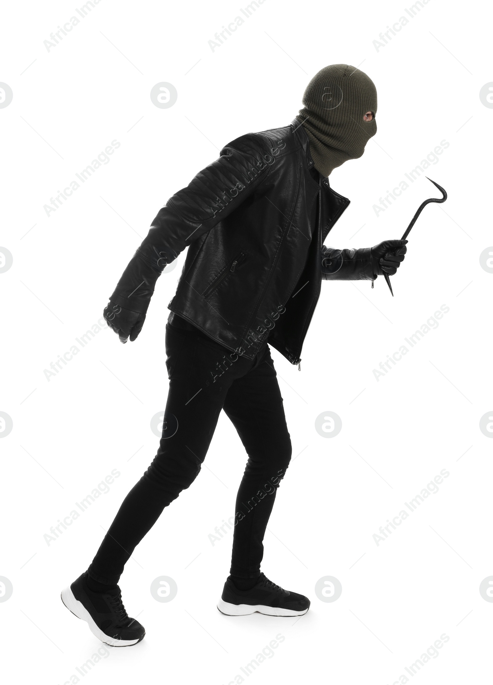 Photo of Man wearing knitted balaclava with crowbar on white background