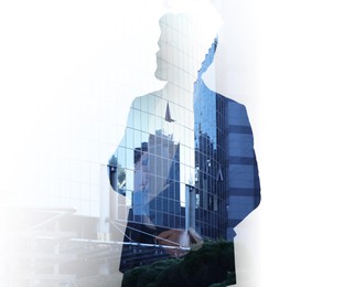 Double exposure of businessman and cityscape with office buildings