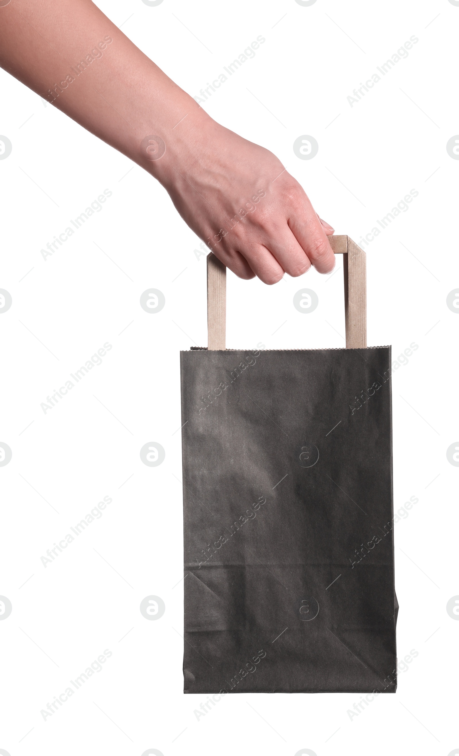 Photo of Woman holding paper shopping bag on white background, closeup