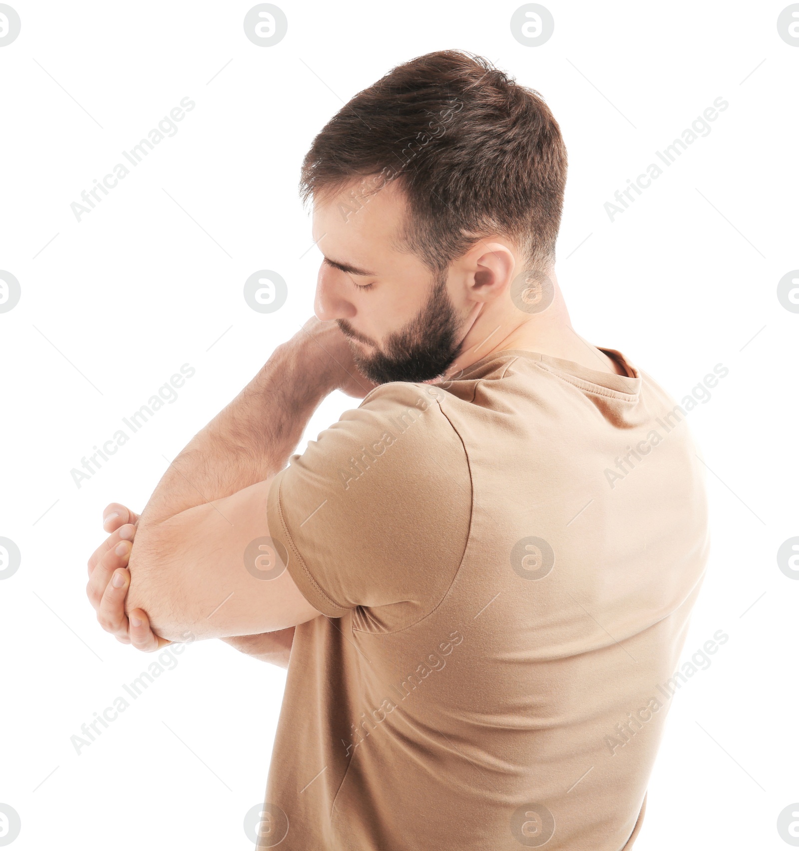 Photo of Young man suffering from pain in elbow on white background