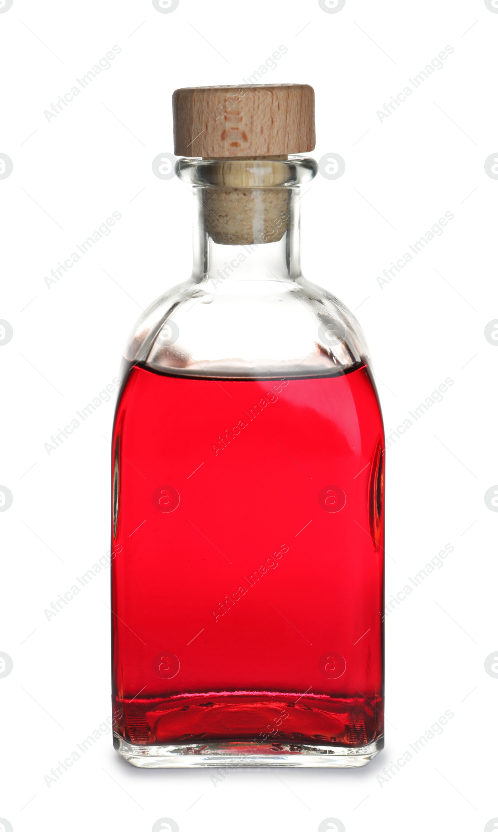 Photo of Glass bottle with wine vinegar on white background