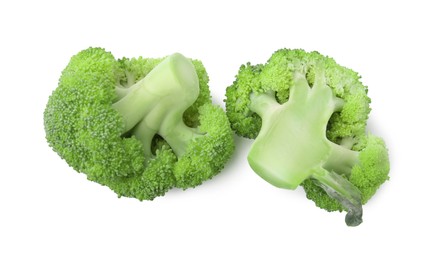 Cut raw green broccoli isolated on white, top view