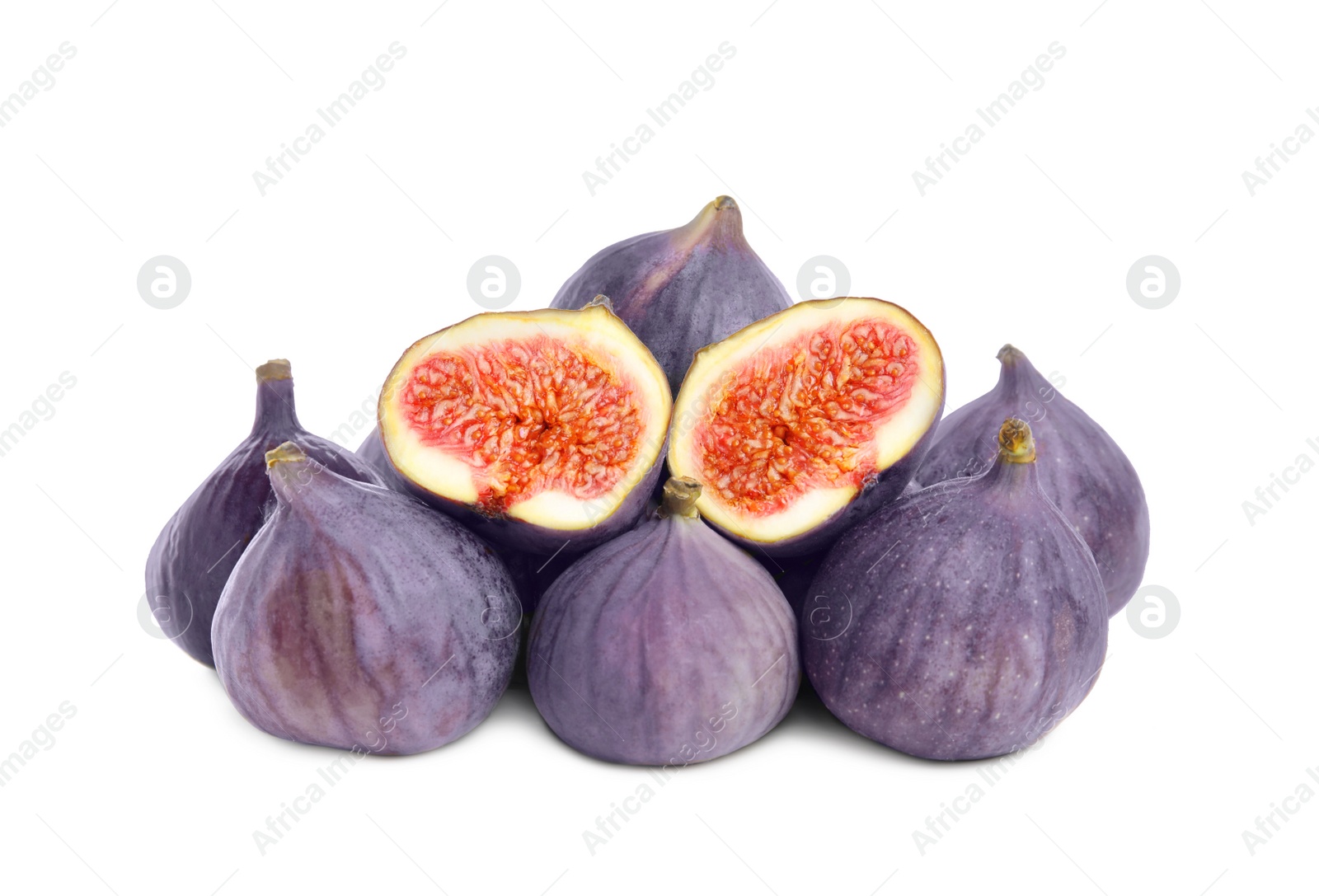 Photo of Whole and cut fresh ripe figs isolated on white